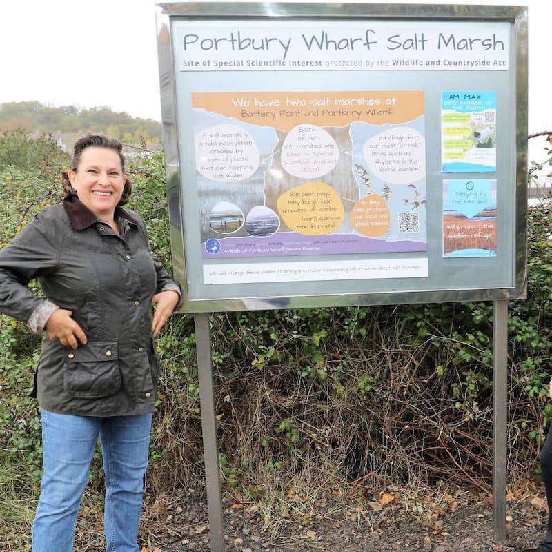 Nicola Holland by the salt marsh noticeboard