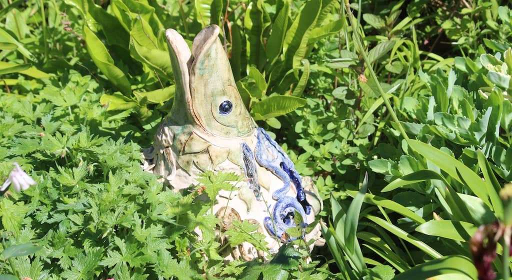 mud monster playing in the undergrowth